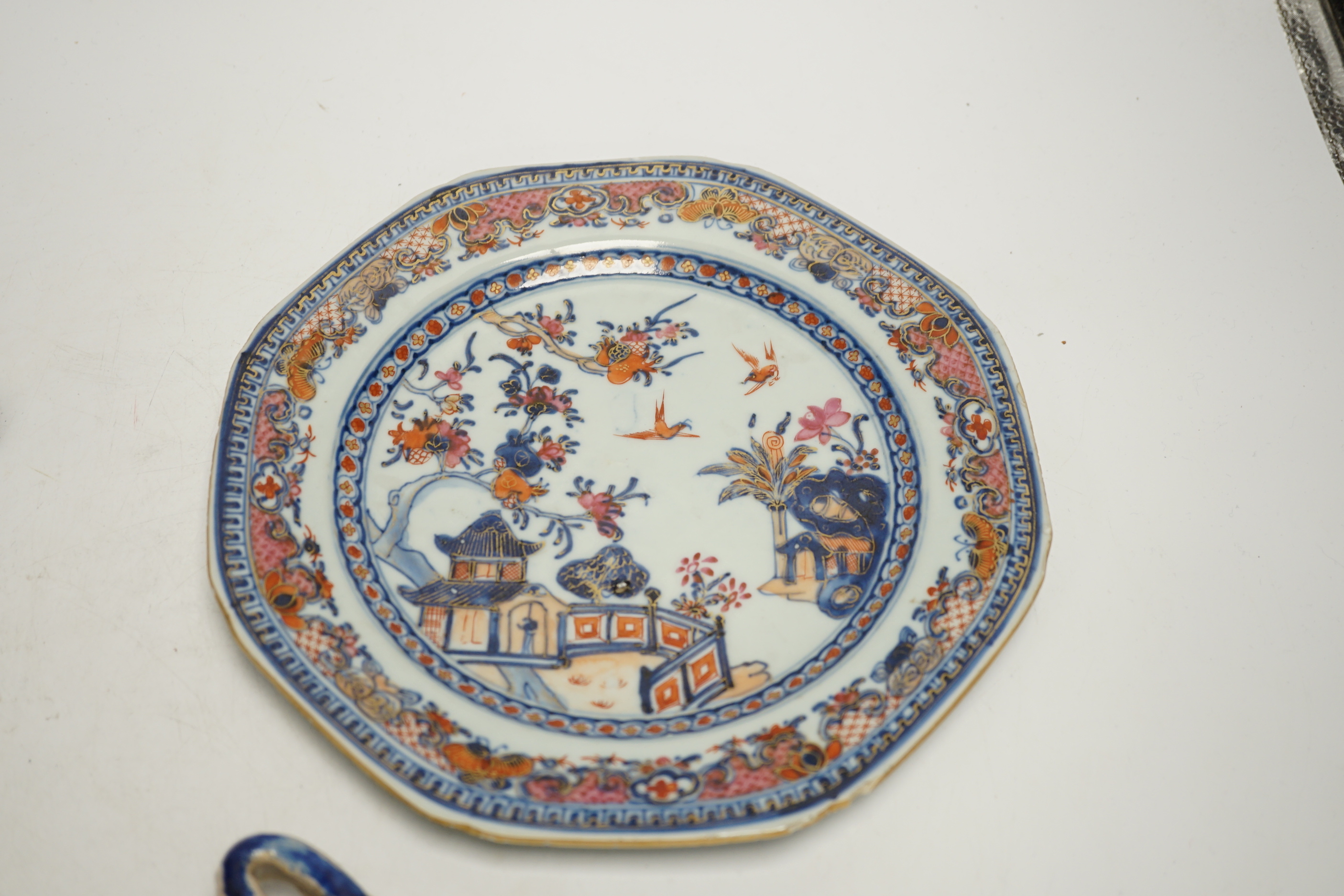 An 18th century Chinese export dish, a Iznik style flask and an onion pattern piece